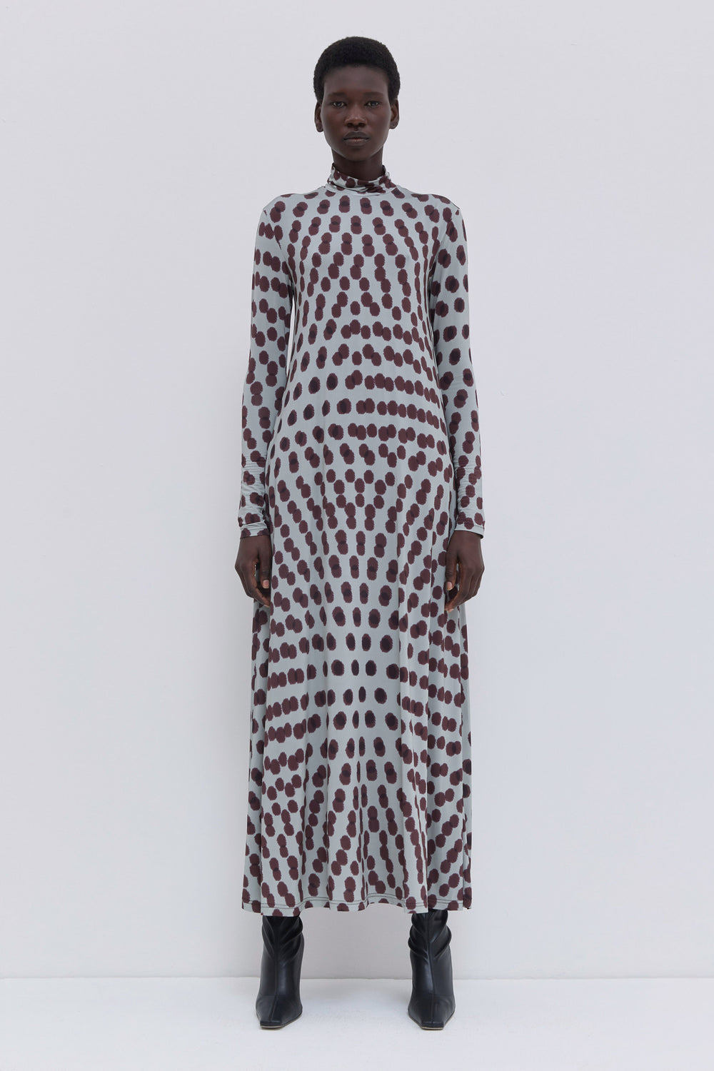 Christian Wijnants Dewika maxi jersey dress in plum Polika print with turtleneck and long sleeves.