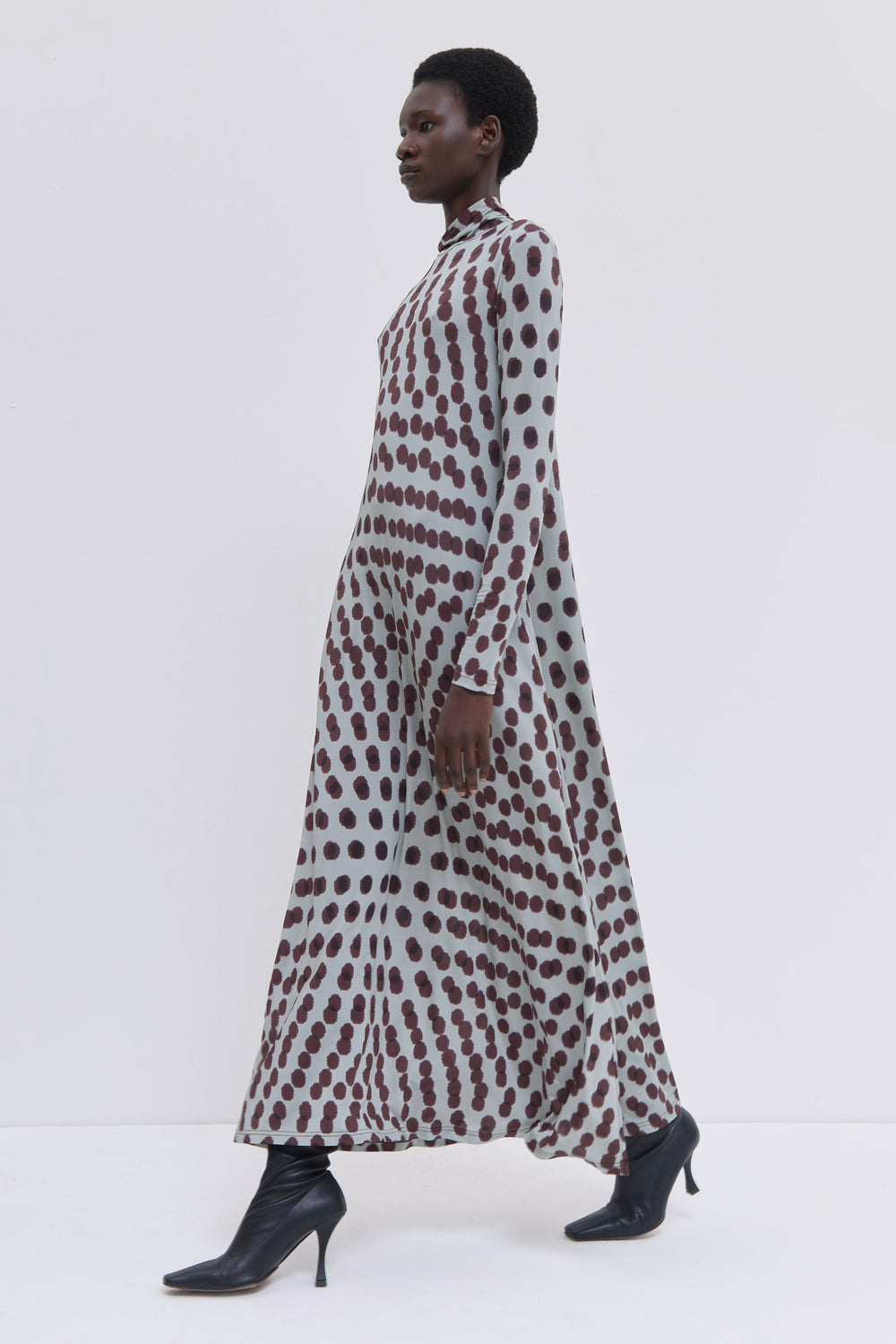Plum Polika print maxi dress in stretch jersey featuring a fluid silhouette, long sleeves and high neckline.