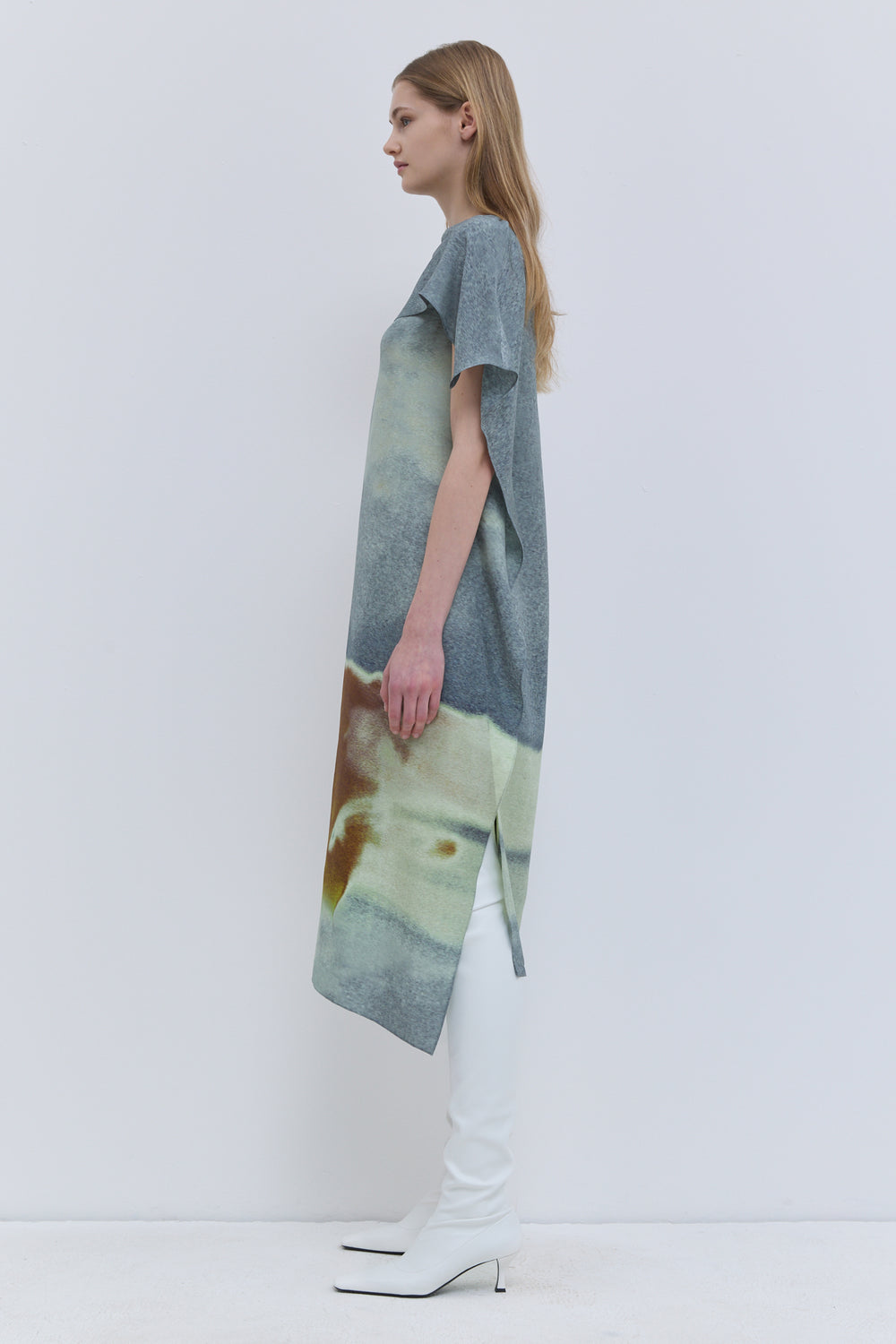 Front view of Durango Winter Sky printed dress with sculptural shoulder flap.