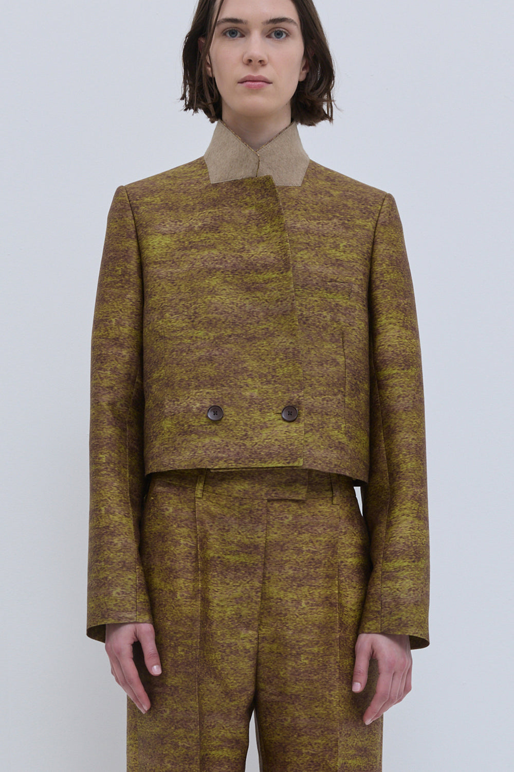 Christian Wijnants gold printed cropped jacket styled with matching wide-leg trousers