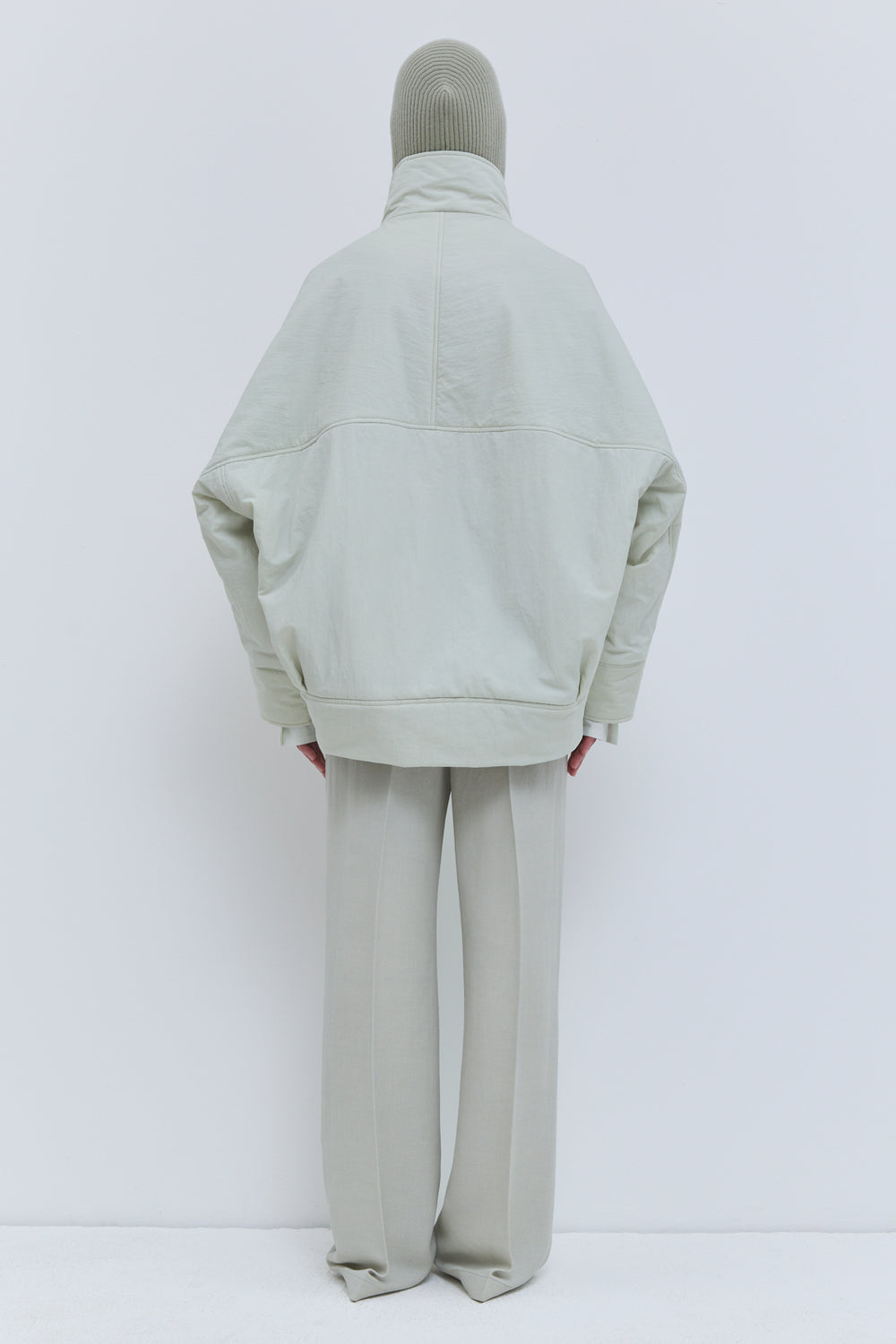 Jombo high collar jacket with rounded oversized sleeves