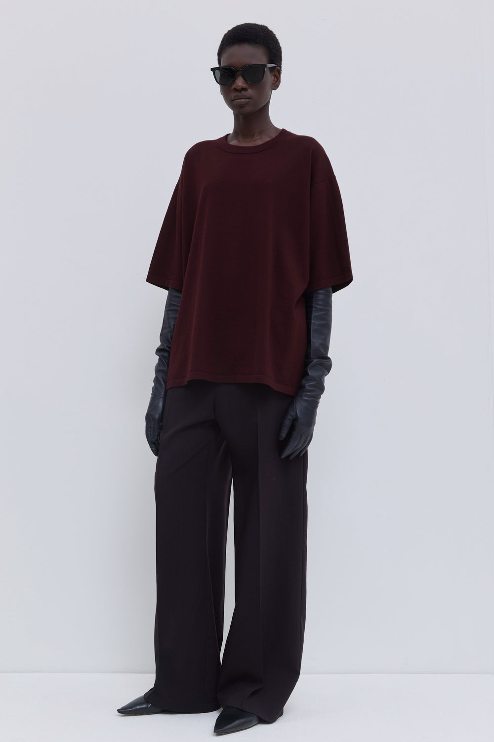 Front view of a plum 100% cotton oversized T-shirt with relaxed fit.