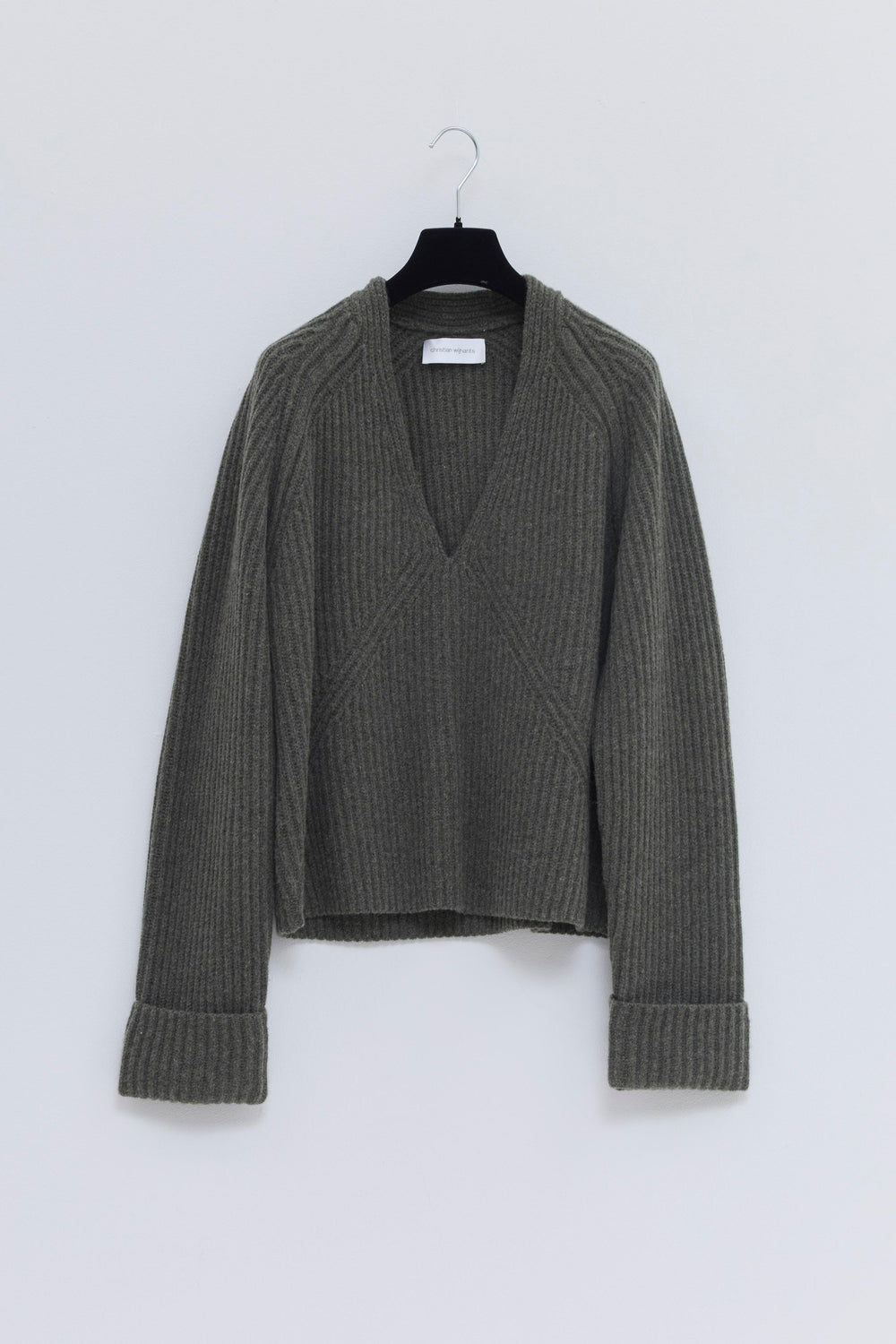 Back packshot of the forest melange ribbed merino wool and cashmere V-neck sweater.
