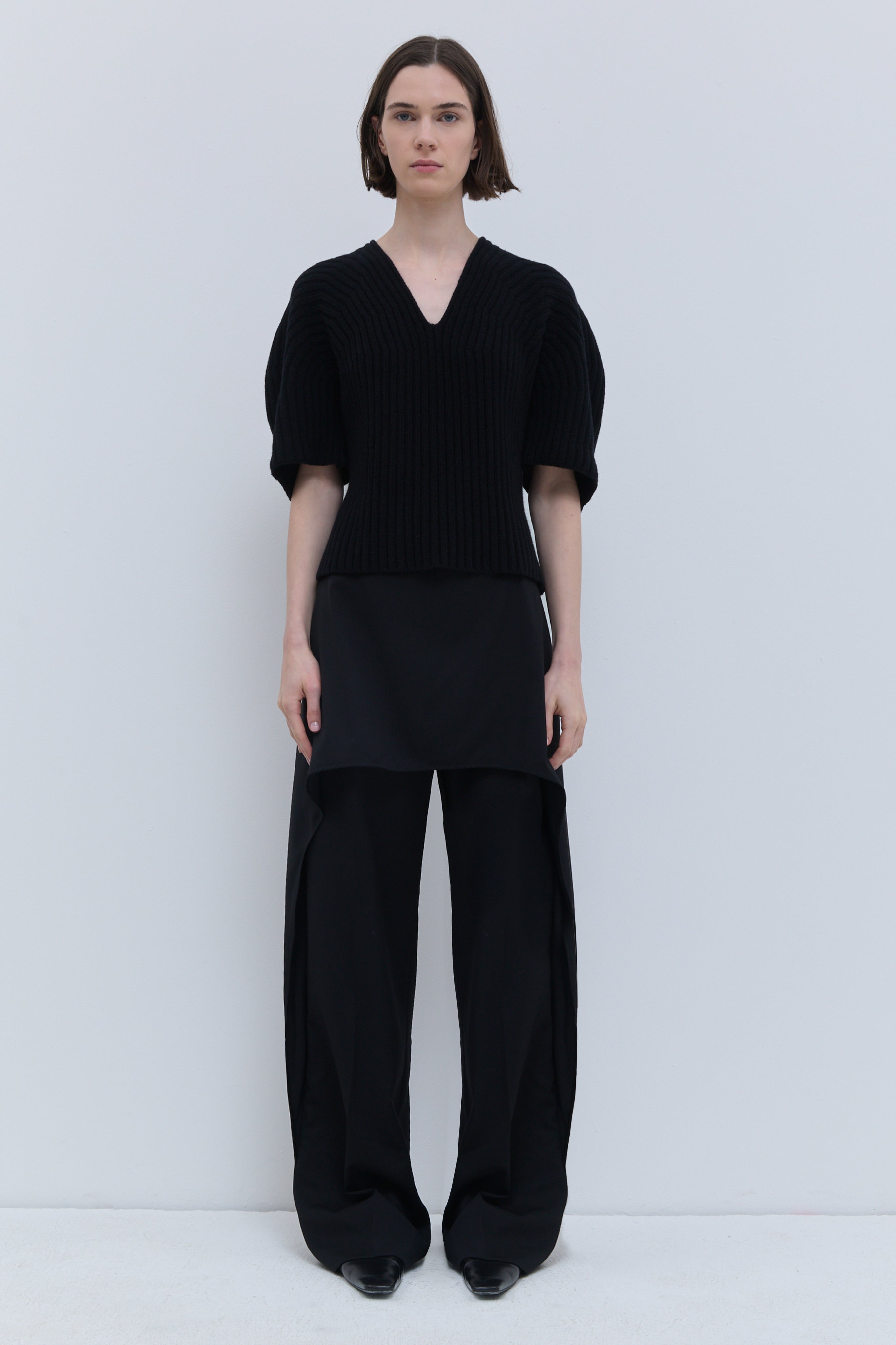 Kisha black 3D rib-knit top in superfine wool