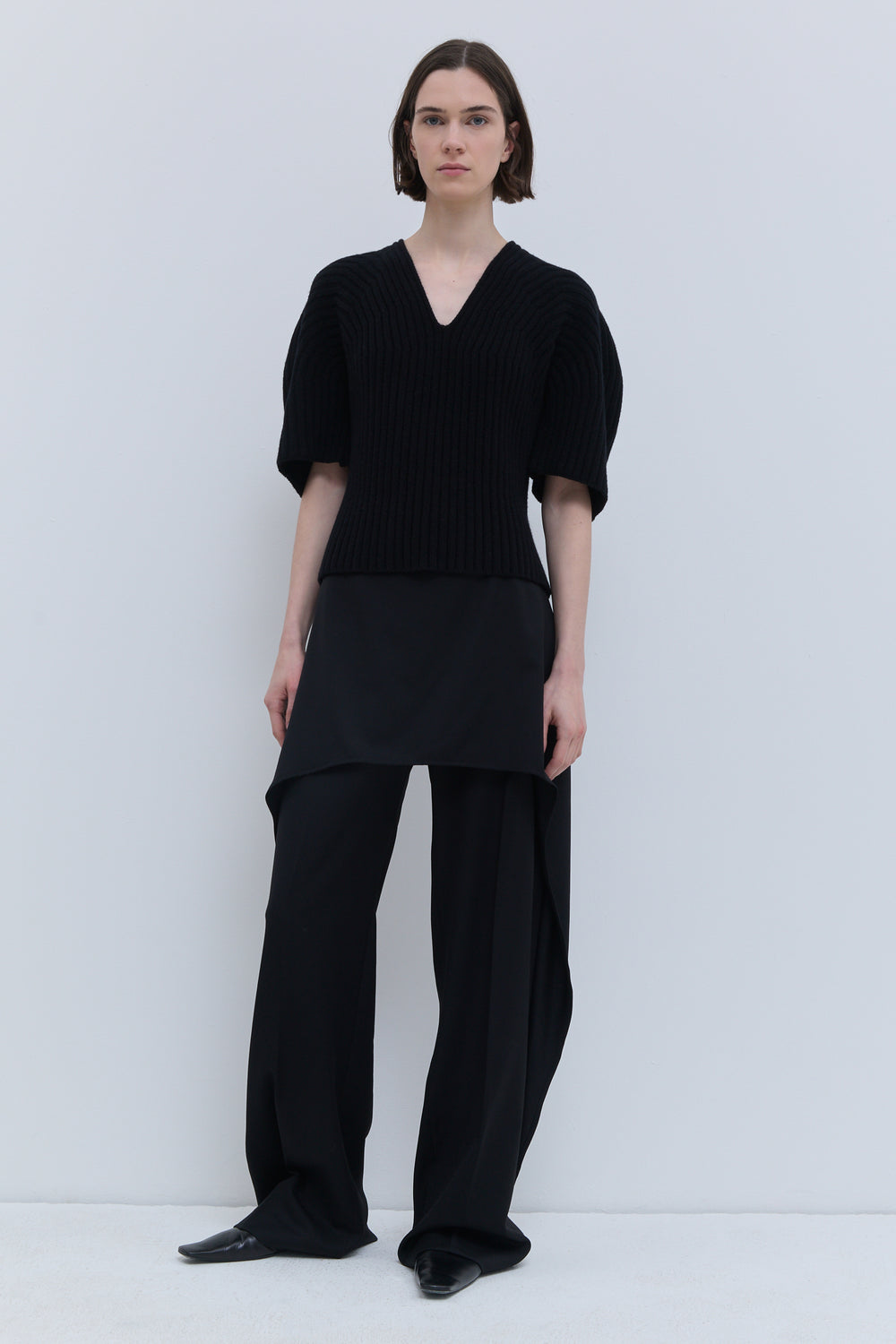 Black chunky rib-knit top with V-neckline