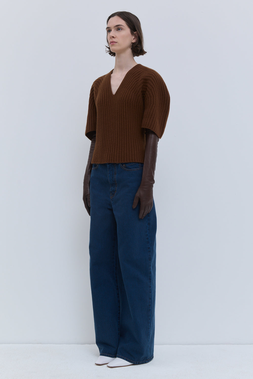 Christian Wijnants rust ribbed top with sculptural sleeves