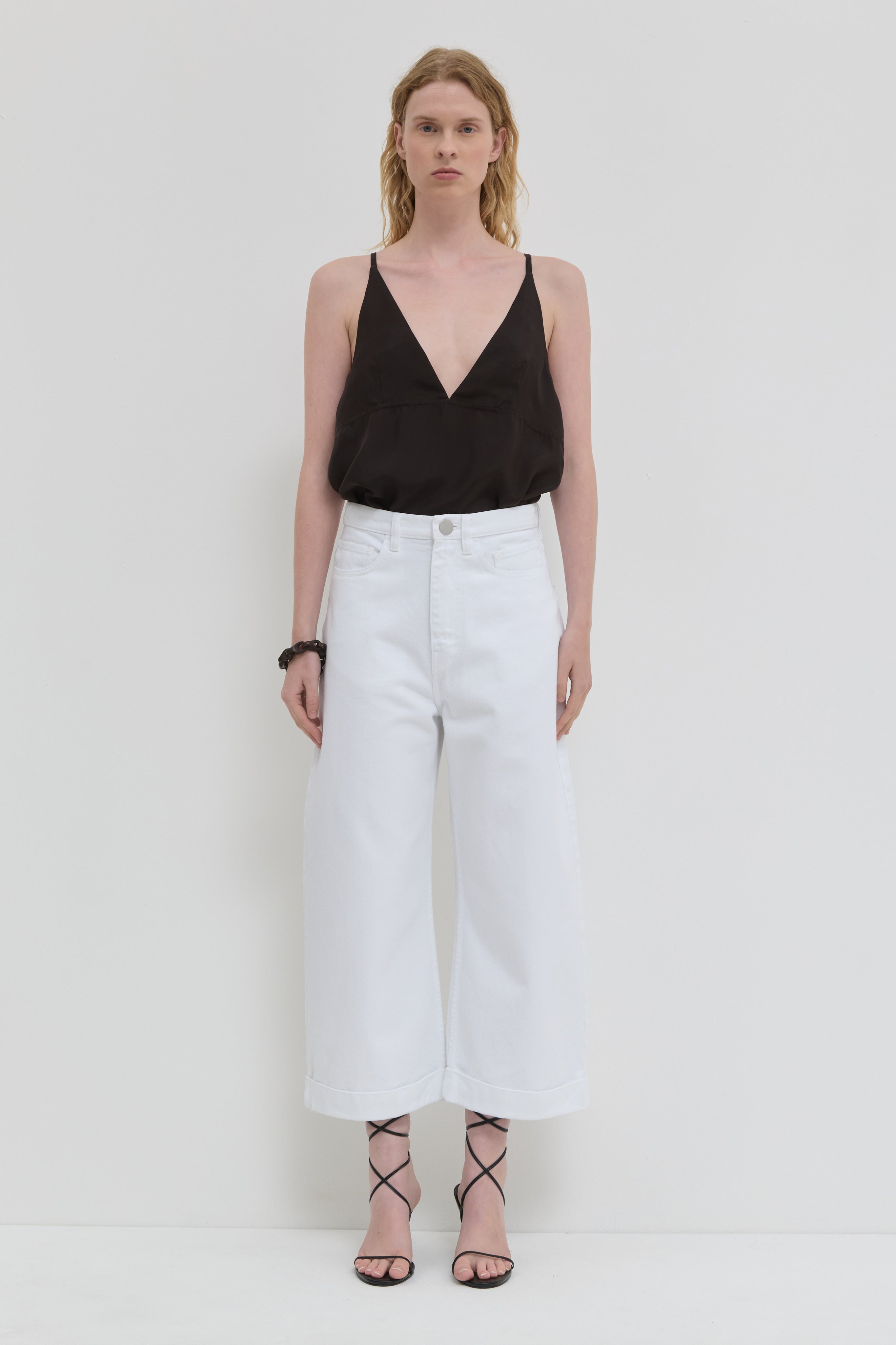 Optical white wide leg cropped jeans with cuff detail front view
