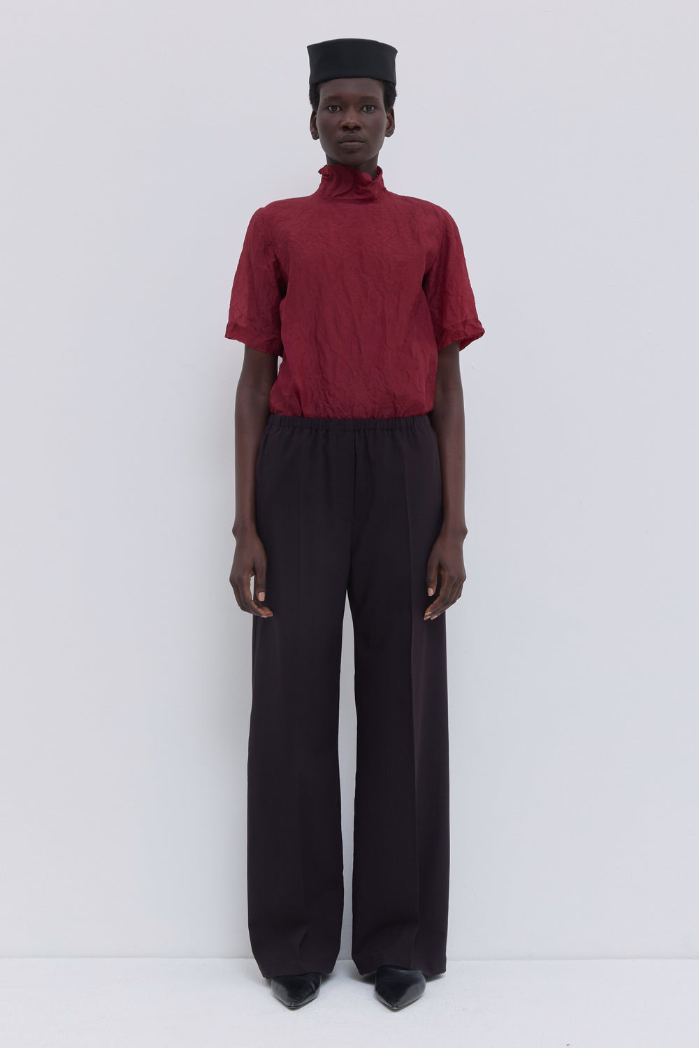 Deep plum low-waist trousers with wide-leg silhouette and elastic waistband