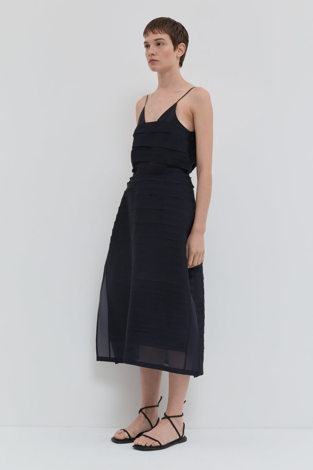 Navy silk organza A-line skirt with handmade bias stroke texture and sheer finish