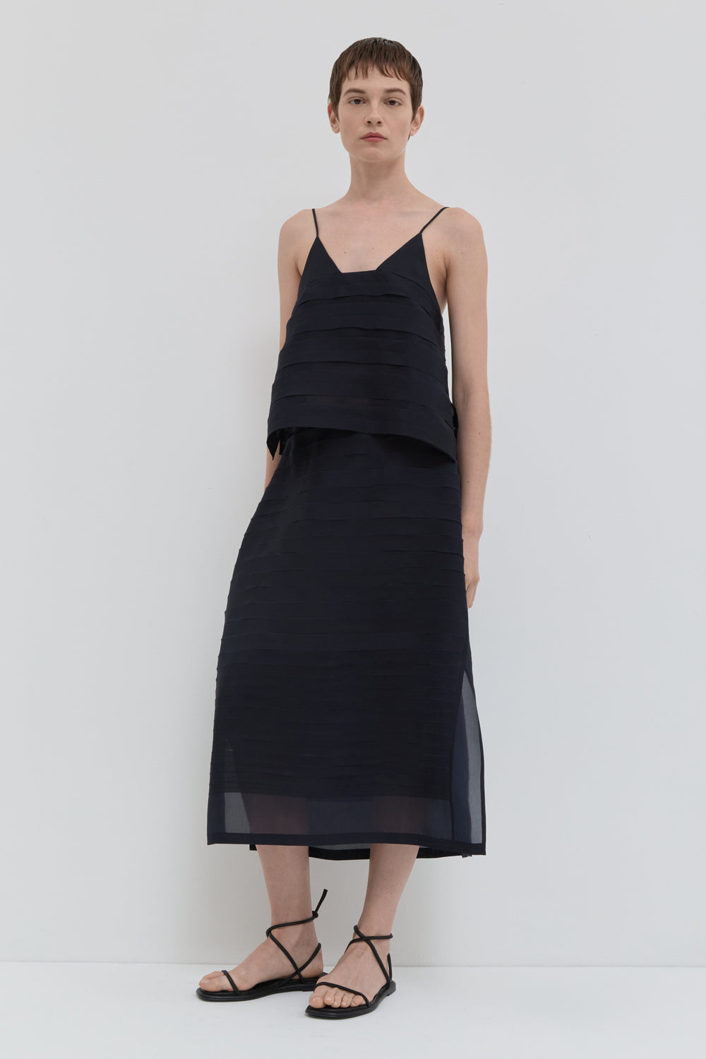 Navy silk organza A-line skirt with handmade bias stroke texture and sheer finish
