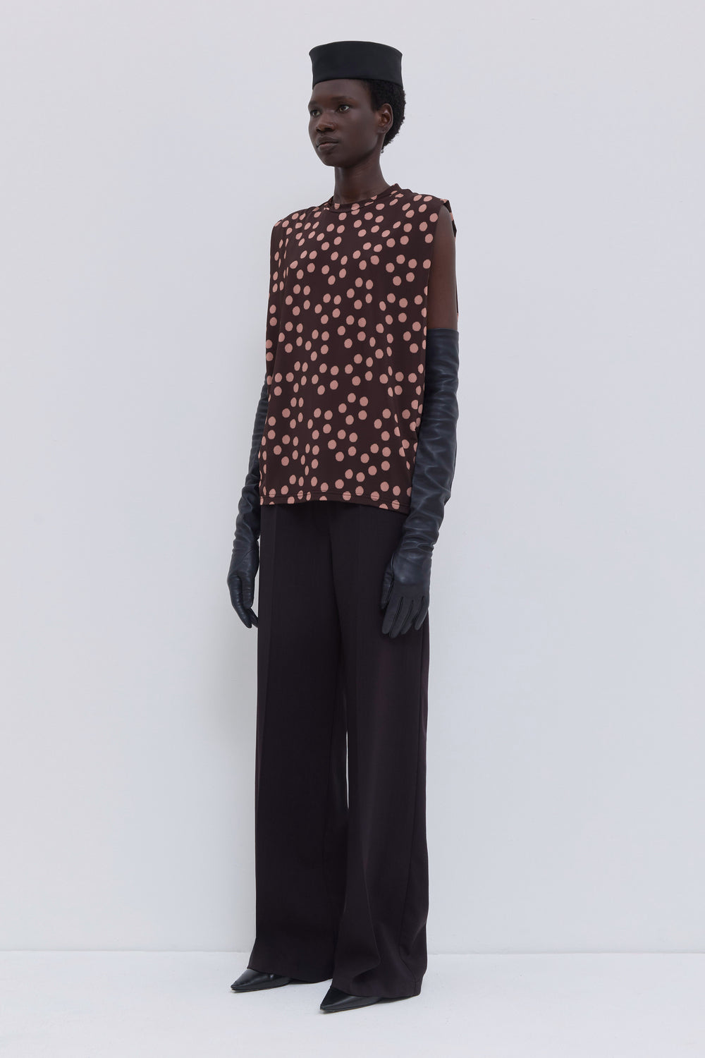 Women’s sleeveless printed top with pink dot pattern