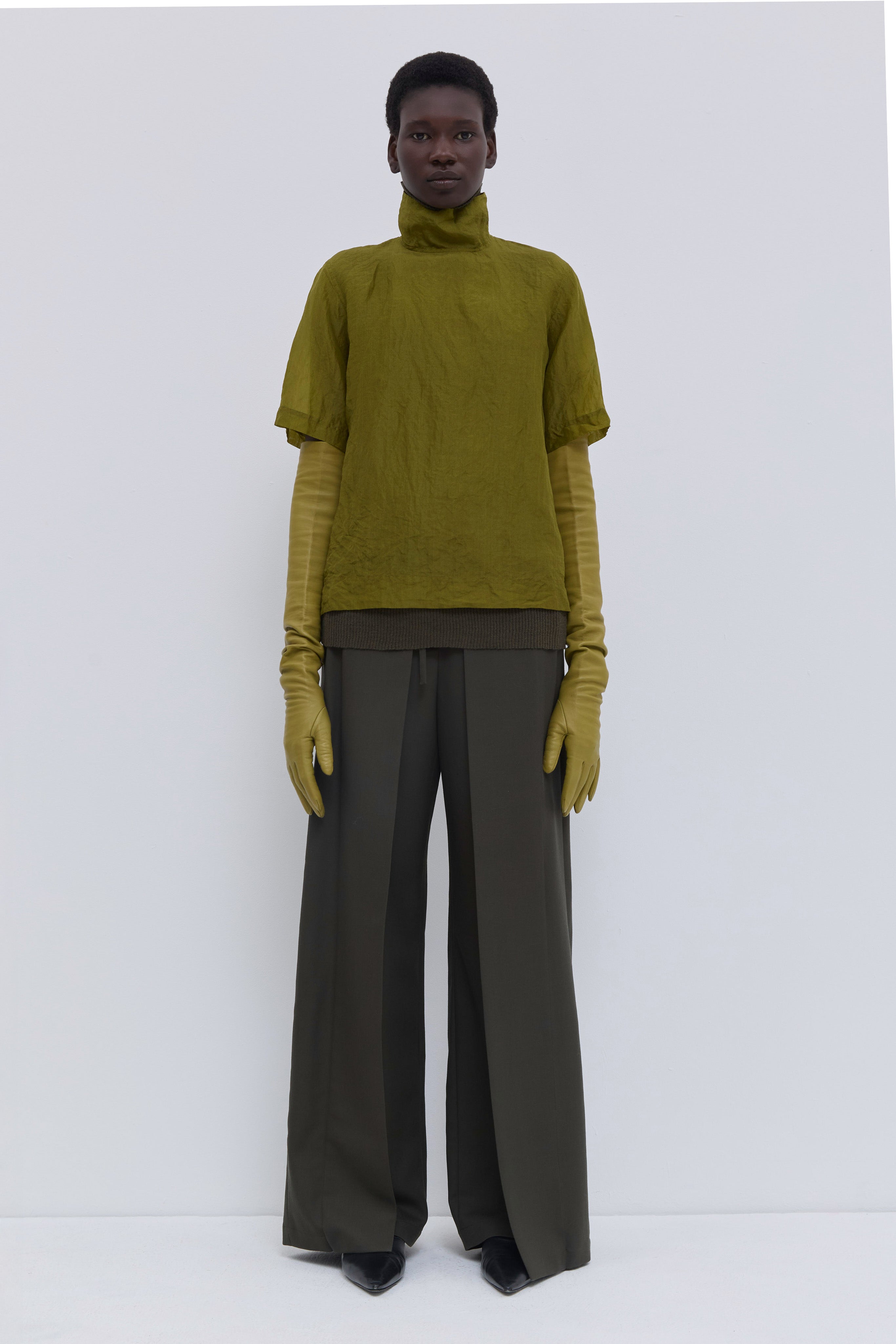 Christian Wijnants Tapulo olive silk organza top with high neck, hand-crushed texture and short sleeves.