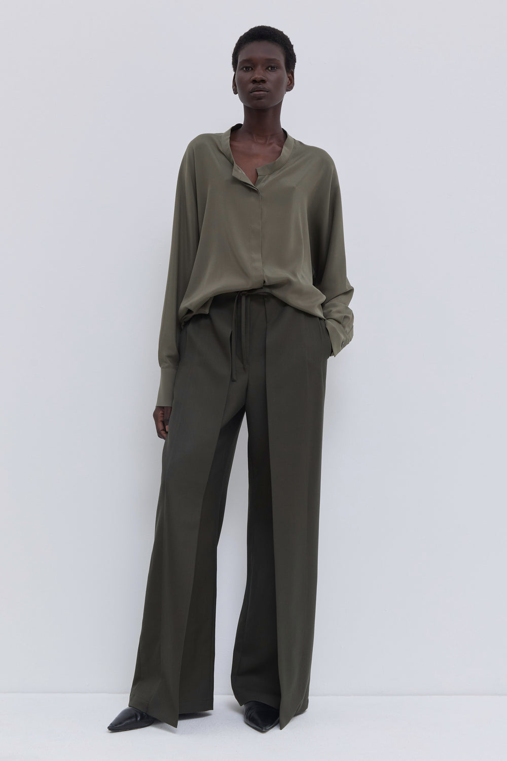 Designer blouse in artichoke with concealed button placket