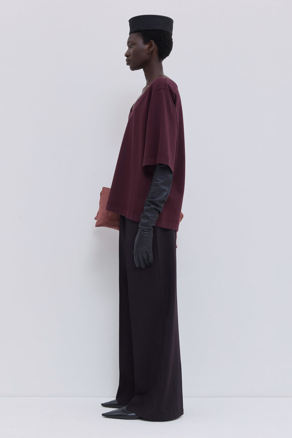 Front view of Tima burgundy jersey top